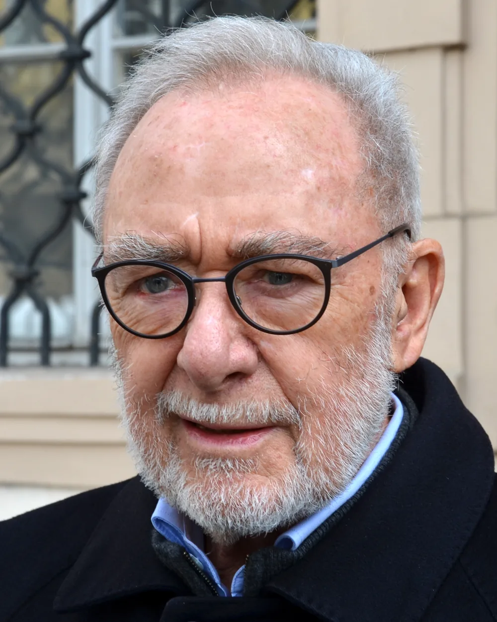Gerhard Richter in 2017 in Prague, an elderly man in a dark jacket looking to the side
