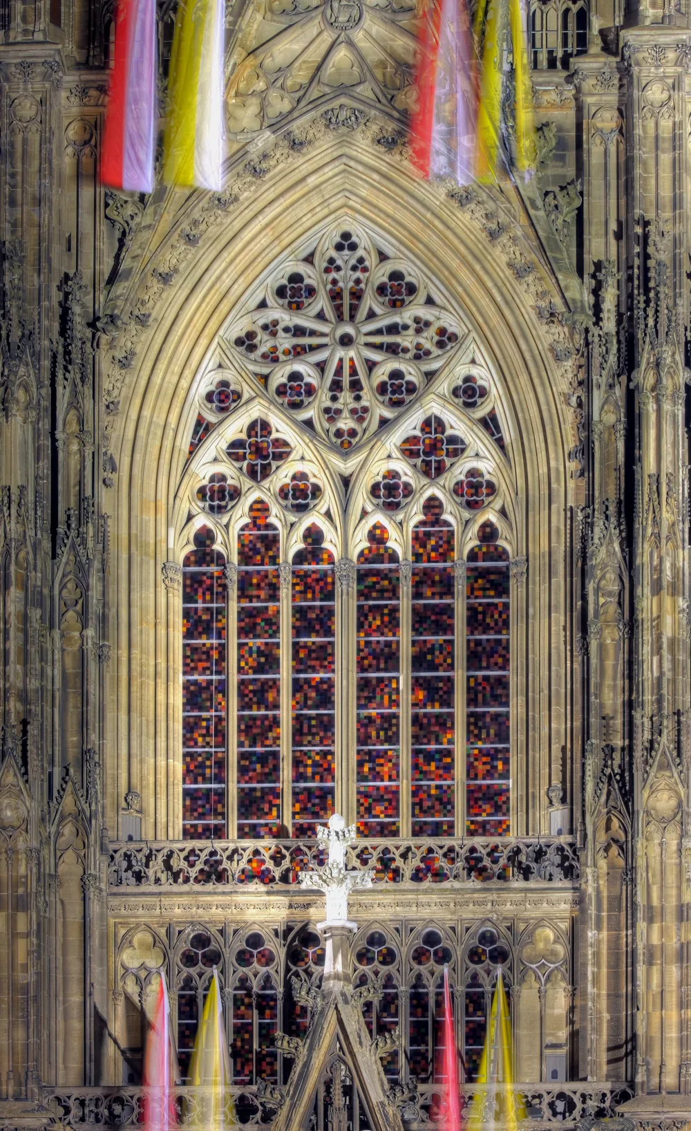 Cologne Cathedral’s south side at night with Richter’s window glowing in thousands of coloured squares