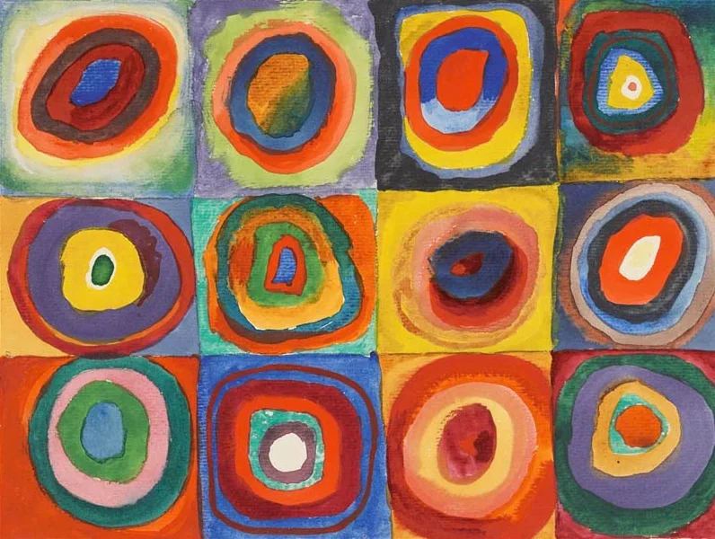 Twelve uneven coloured squares each contain nested rings painted in contrasting colours