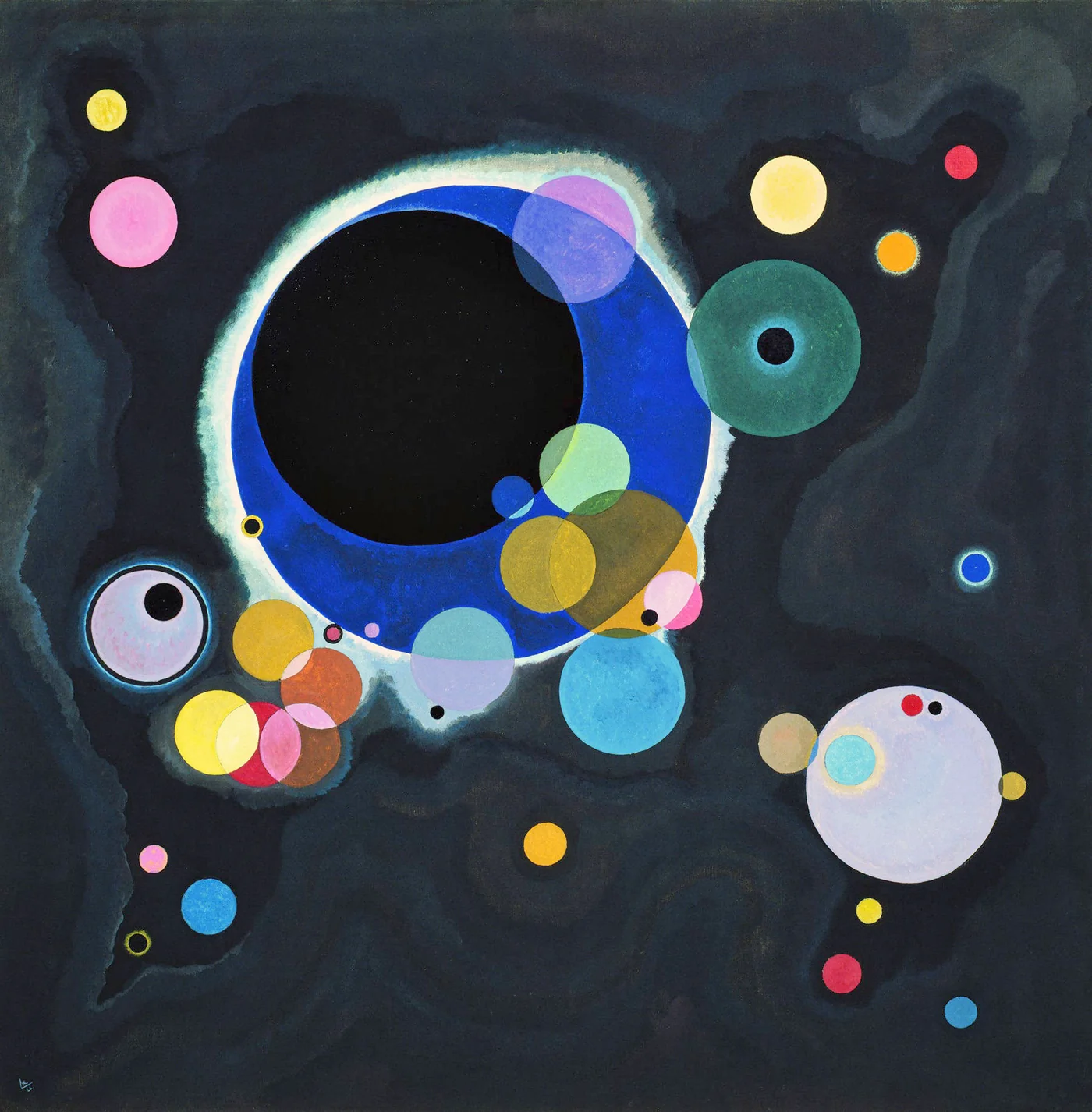 Translucent coloured circles of different sizes overlap on a dark atmospheric background