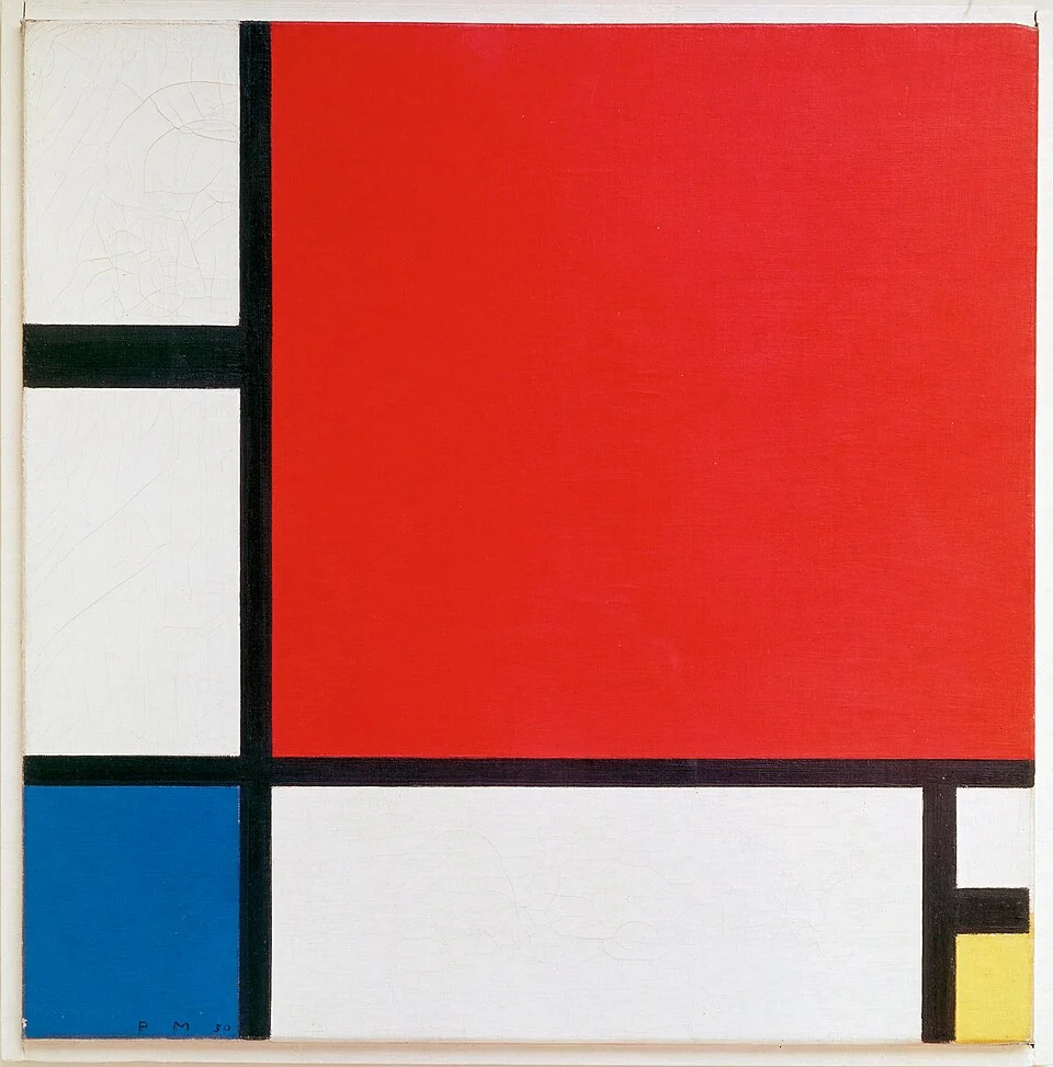 Large red upper-right field, a small blue lower-left field and a narrow yellow area separated by thick black lines