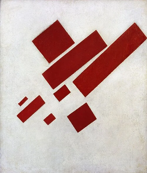 Eight separate red rectangular forms of different sizes and angles float on white